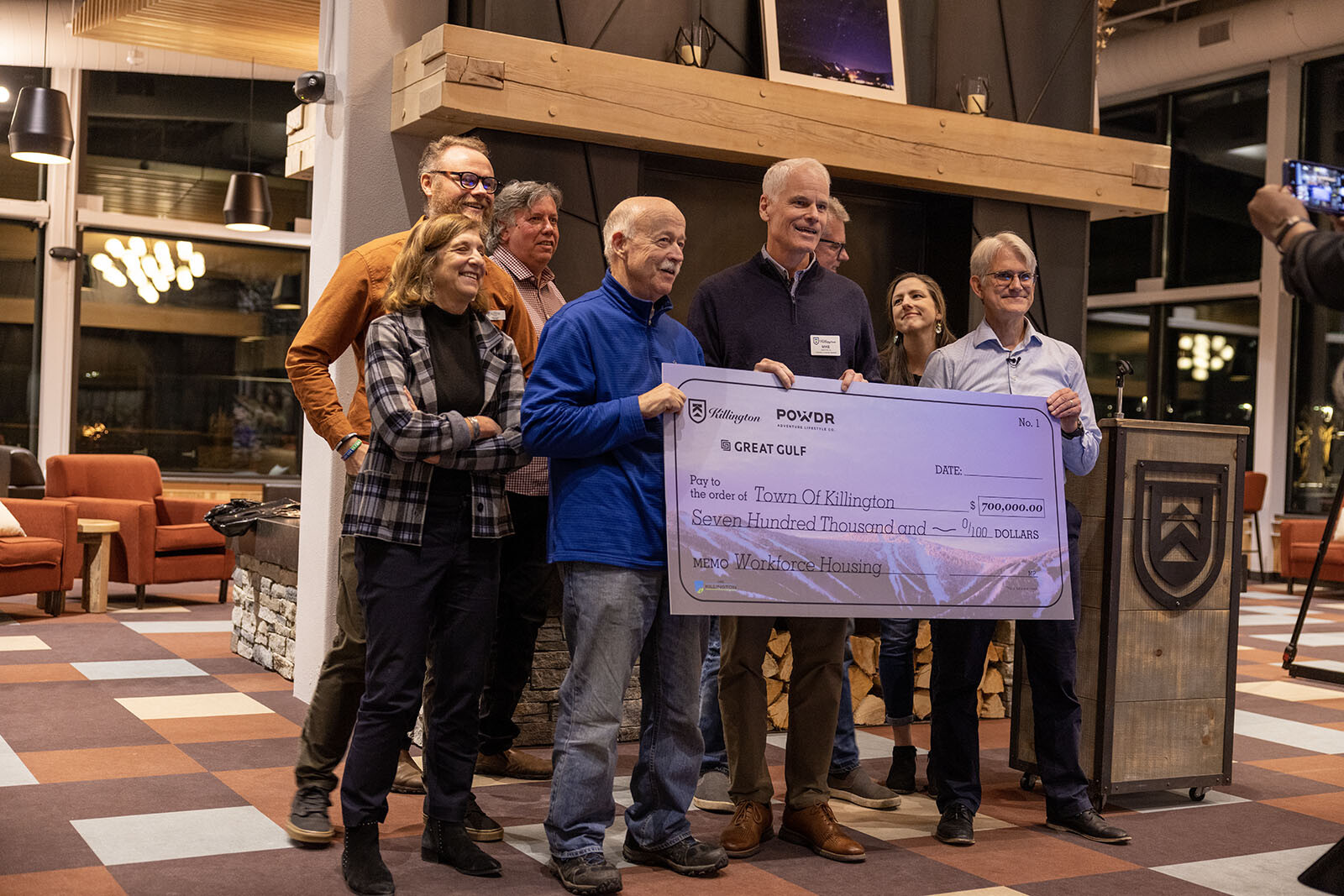 Group of people holding a large check for $700,000 for Killington's workforce housing.
