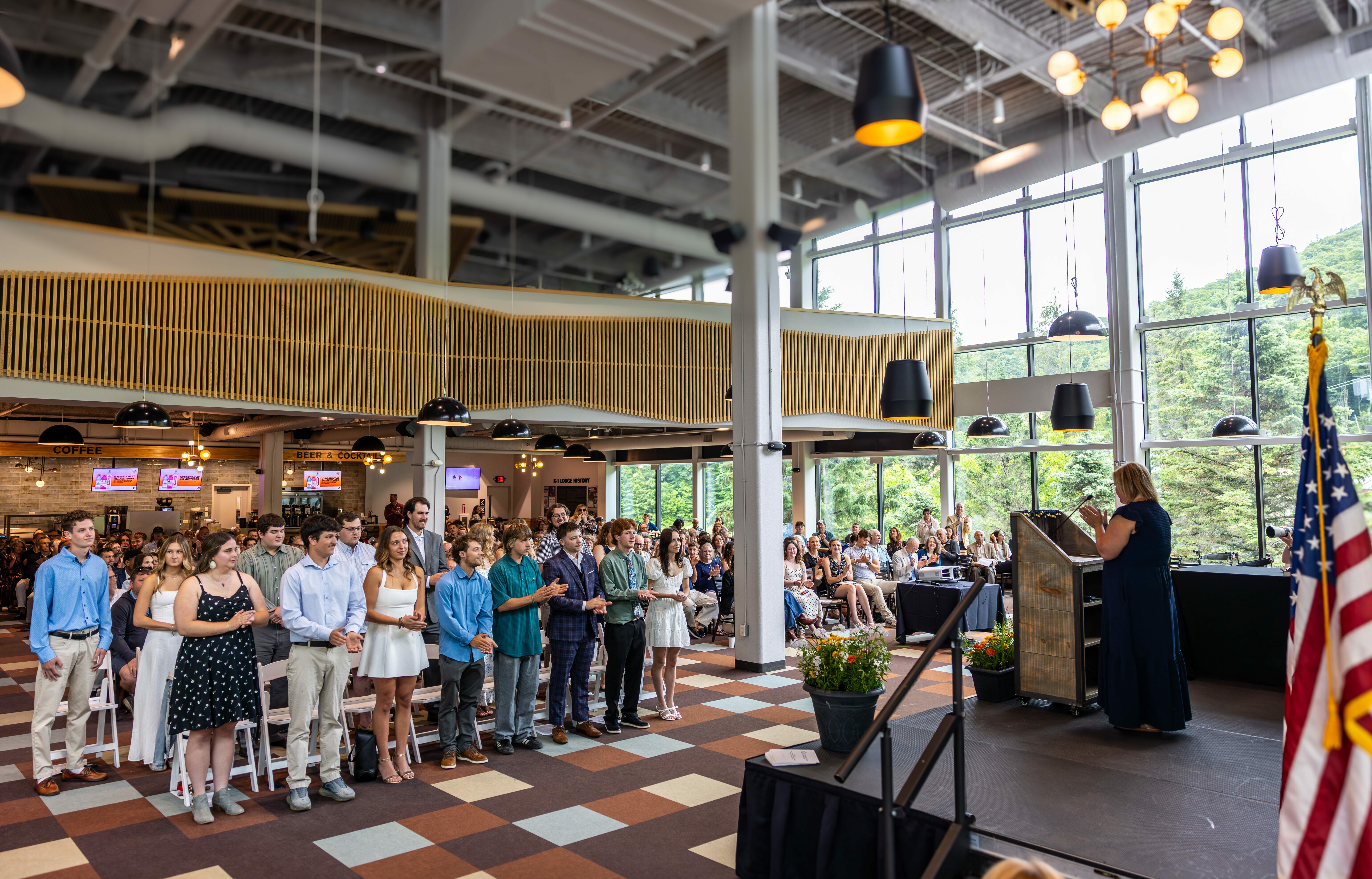 Students and crowd applaud 2026 RHM graduates
