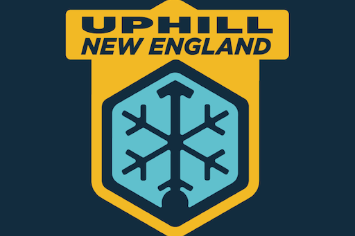 Logo featuring "Uphill New England" and a blue snowflake inside a yellow shield.