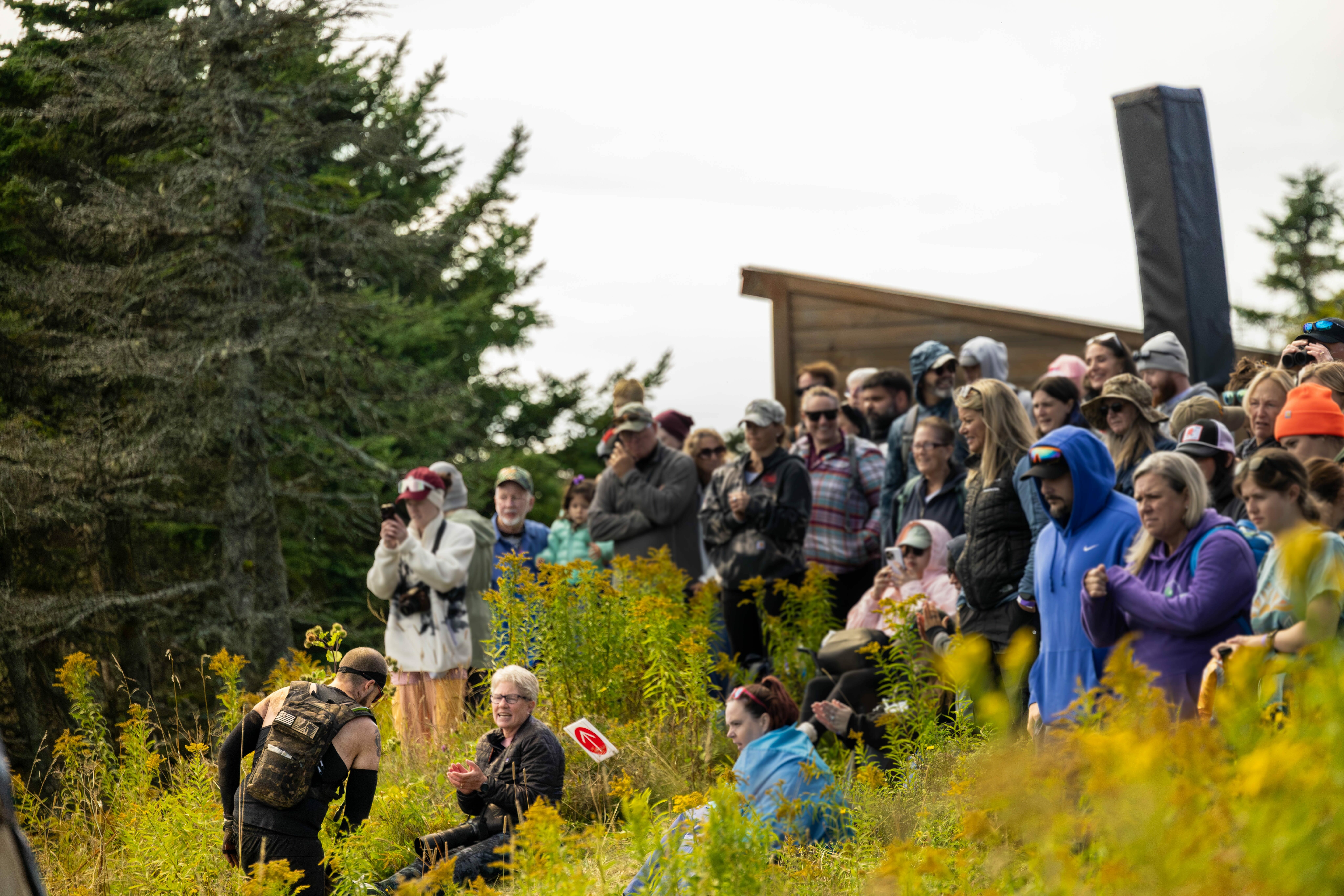 A crowd cheers on participants during Spartan Race at Killington.