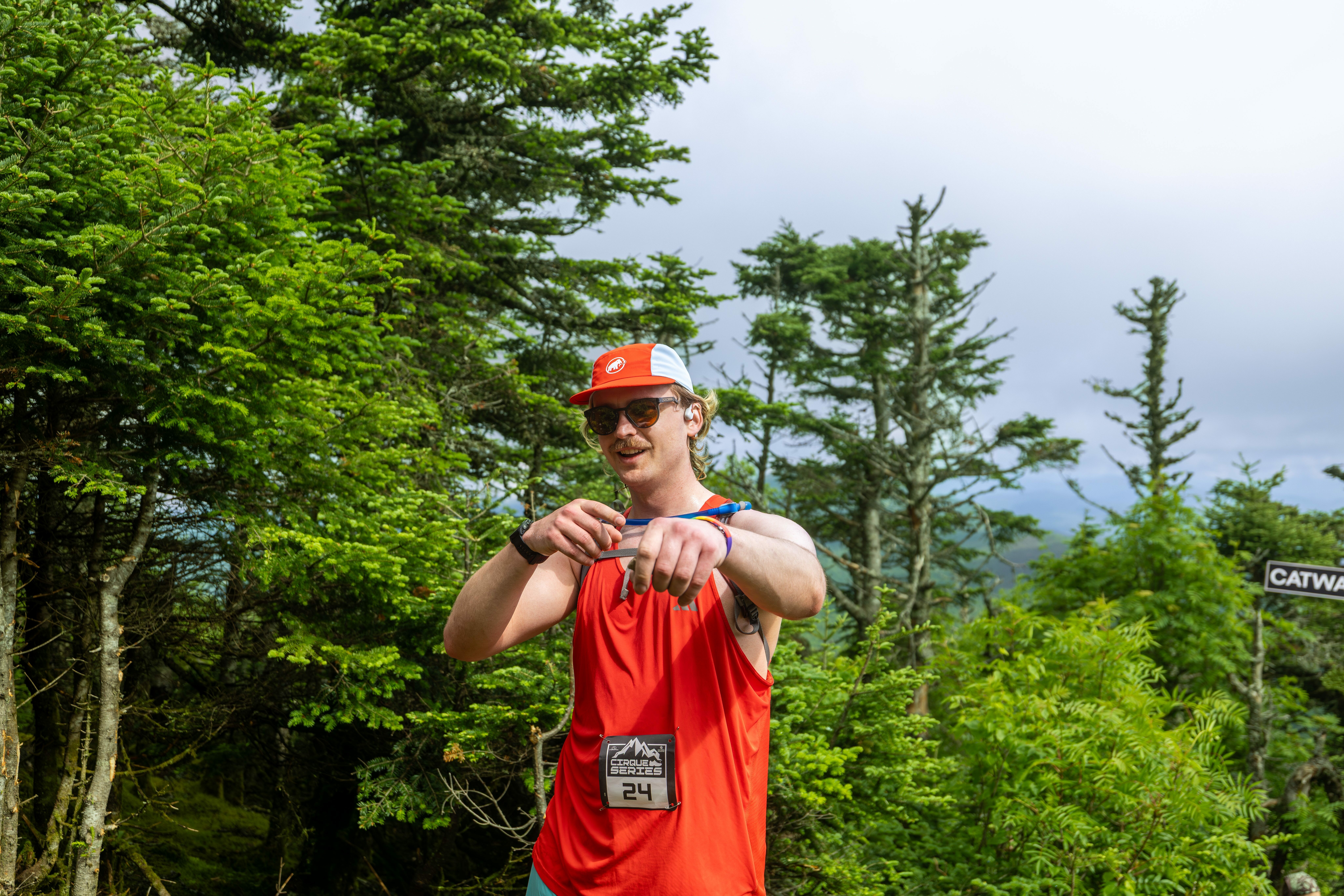 Racer poses for photo during Cirque Series at Killington