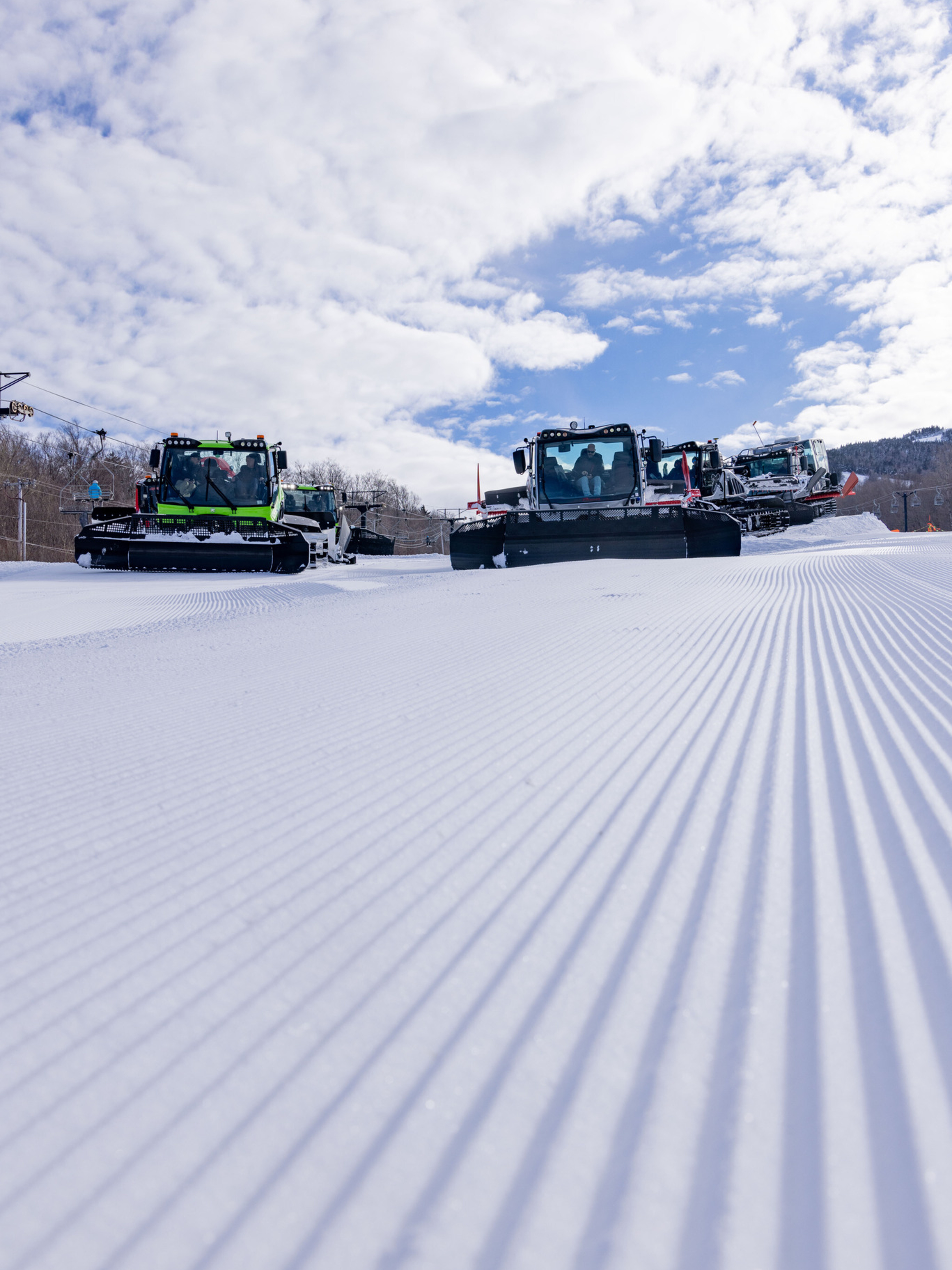 Grooming tractors posed on Killington's Snowshed Slope