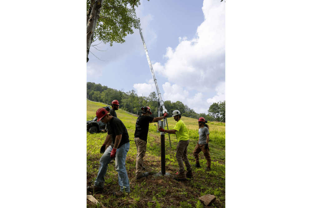 Mountain Operations putting together new snowguns along the side of Highline
